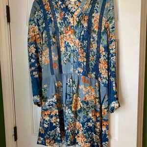 Long sleeved multi patterned light blue dress